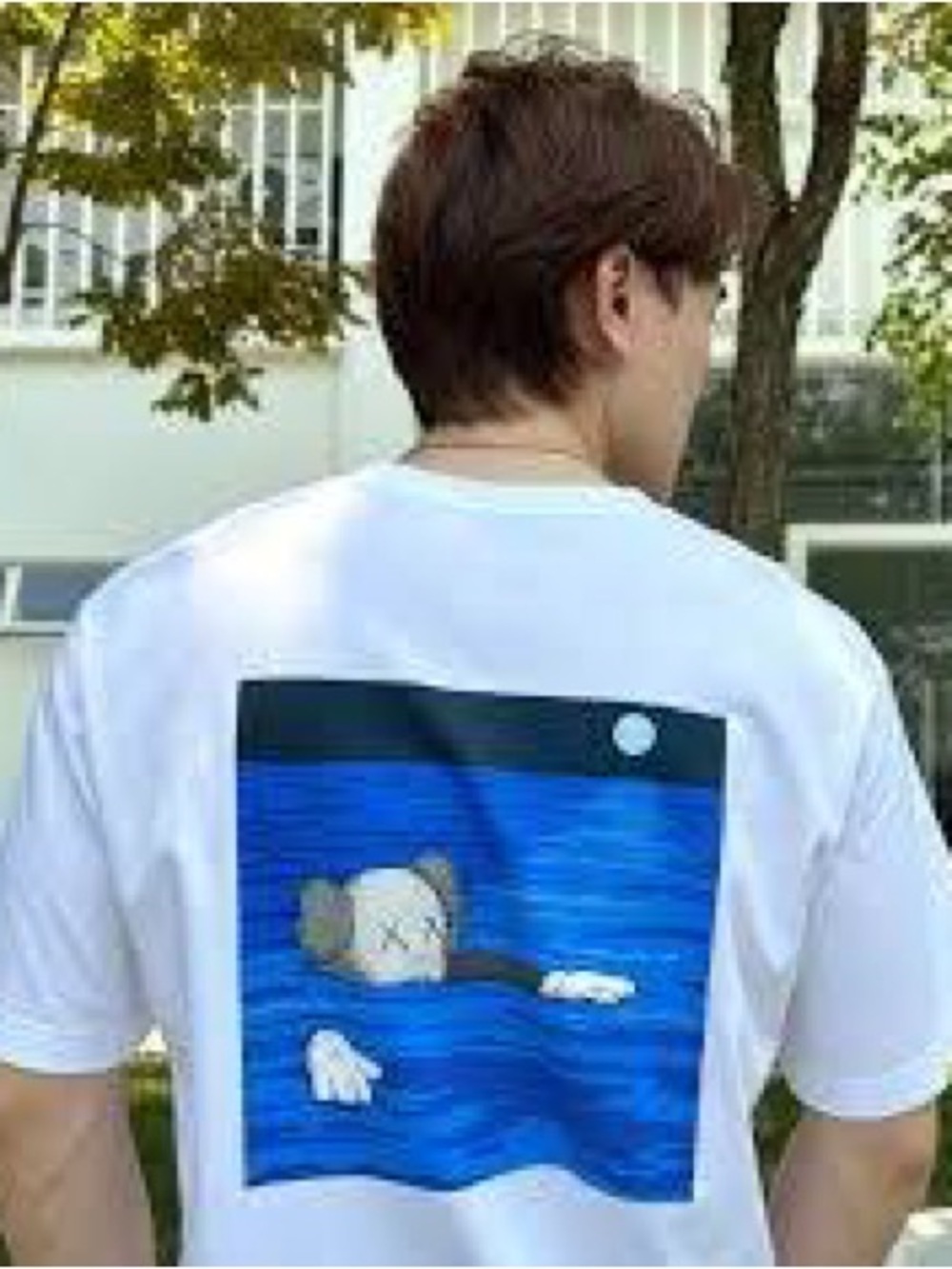 KAWS X Uniqlo “Swimming Artbook Cover” White Graphic T-Shirt Men’s Size Medium